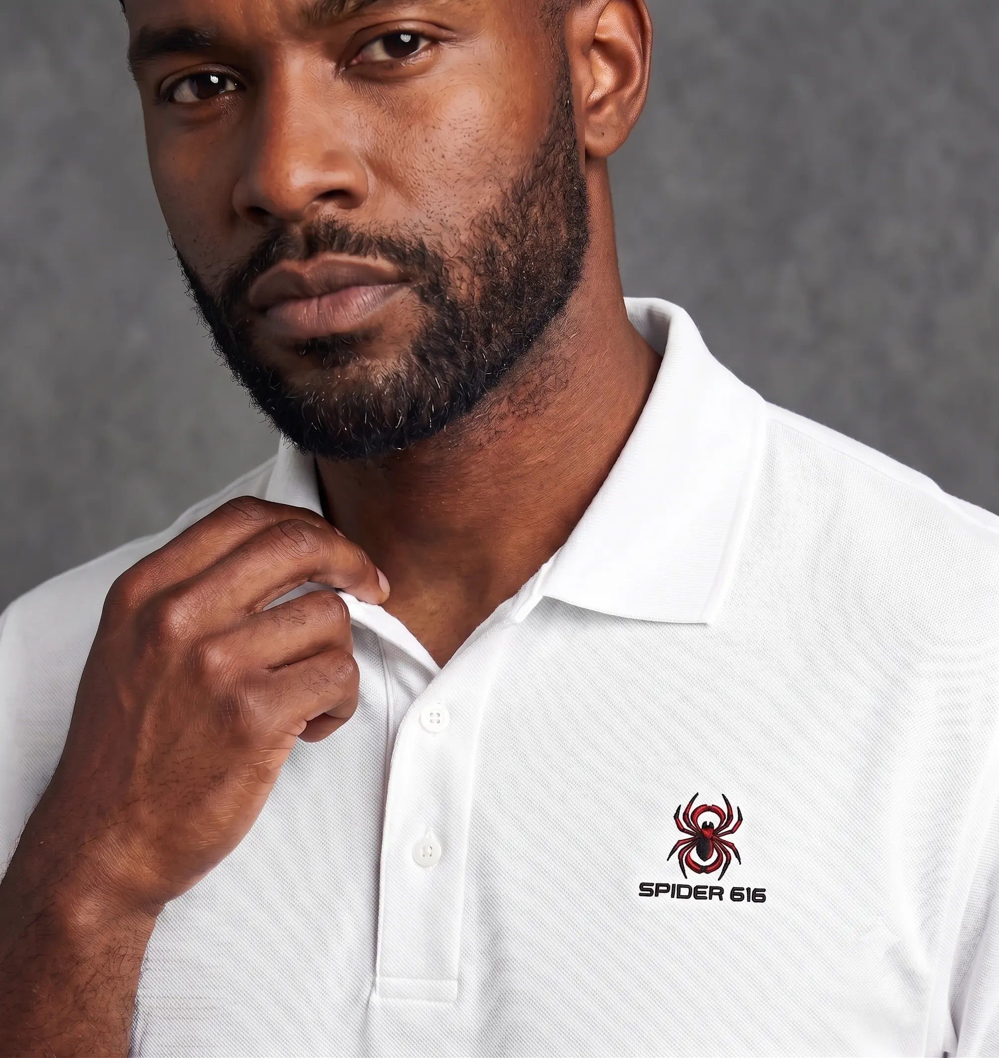 Man wearing the SPIDER 616 white polo in a real fit photo